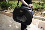 Tough-Shell Wheeled Dog Carrier (Color: Black)